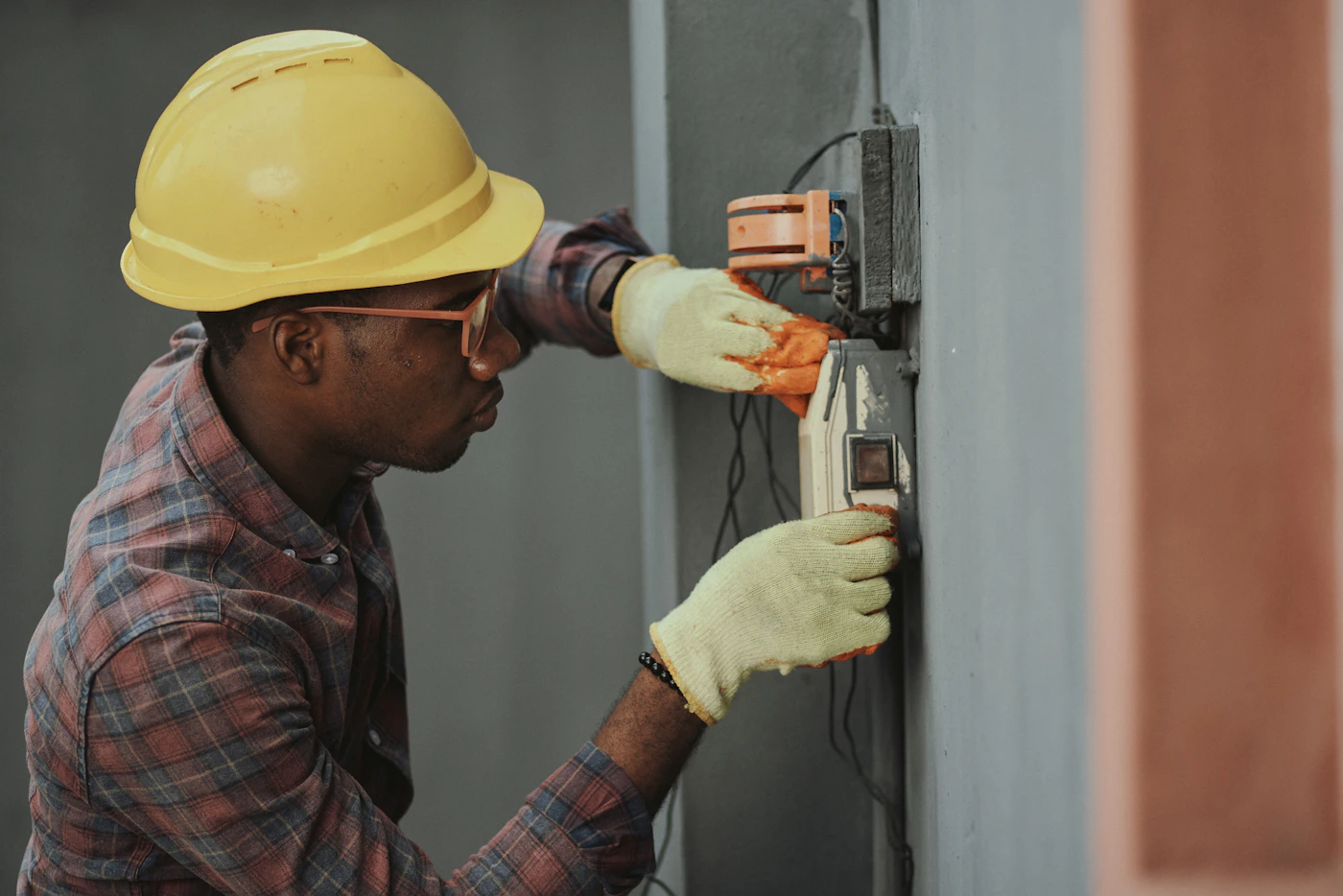 An electrical worker attending to wiring